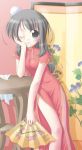  1girl arm_support black_eyes black_hair bun_cover chin_rest china_dress chinese_clothes dress fan flower folding_fan folding_screen indoors leaning mouth_hold smile solo table towel wink 