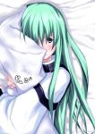  1girl c.c. code_geass female green_hair long_hair lying pillow pillow_hug solo soumi_shizuru 