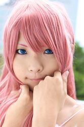  asian blue_eyes cosplay gundam gundam_seed gundam_seed_destiny highres meer_campbell photo pink_hair solo 