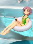  1girl barefoot book brown_eyes casual_one-piece_swimsuit feet figure green_swimsuit innertube nagato_yuki no_humans one-piece_swimsuit open_book parted_lips photo purple_hair short_hair solo suzumiya_haruhi_no_yuuutsu swimsuit water wonder_festival wonder_festival_2007 