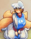  1girl blonde_hair breasts bright_pupils chanta_(ayatakaoisii) eyebrows_visible_through_hair fox_tail hands_on_own_thighs hat highres huge_breasts long_sleeves looking_at_viewer multiple_tails pillow_hat sitting slit_pupils socks solo sweatdrop tail tassel touhou wariza wide_sleeves yakumo_ran yellow_eyes 