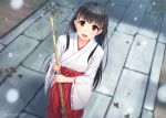  1girl :d bamboo_broom bangs black_hair blurry blush broom brown_eyes dated depth_of_field from_above hakama japanese_clothes long_hair long_sleeves looking_at_viewer looking_up miko miyai_max open_mouth original ribbon-trimmed_sleeves ribbon_trim smile snowing solo standing wide_sleeves 