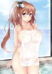  1girl absurdres arm_support bathing blue_eyes breasts brown_hair hair_between_eyes hand_on_own_chest highres kantai_collection large_breasts long_hair looking_at_viewer naked_towel partially_submerged ponytail saratoga_(kantai_collection) see-through side_ponytail sideboob sitting smile soaking_feet steam thighs tomo_(tomojo_8) towel wading water wet wet_towel 