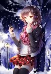  1girl against_tree black_legwear black_sweater brown_hair cellphone covering_mouth eyebrows_visible_through_hair hand_over_own_mouth highres holding holding_phone long_hair looking_at_phone night original outdoors phone pleated_skirt red_skirt skirt smartphone snow snowing solo sweater thigh-highs tree wsman yellow_eyes zettai_ryouiki 