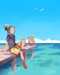  1boy alolan_raichu bangs_pinned_back black_hair closed_eyes dark_skin dark_skinned_male full_body green_hair hair_ornament hau_(pokemon) highres male_focus male_swimwear mei_(maysroom) ocean outdoors pier pokemon pokemon_(creature) pokemon_(game) pokemon_sm ponytail shirt short_hair shorts sitting sky smile solo swim_trunks swimwear t-shirt wingull 