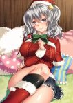  1girl alternate_costume aran_sweater black_legwear blue_eyes blue_skirt blush boots bow breasts christmas_ornaments eyebrows_visible_through_hair green_bow hair_between_eyes hair_ornament hat heart heart_pillow highres indoors jacket kantai_collection kashima_(kantai_collection) keita_(tundereyuina) large_breasts long_sleeves looking_at_viewer on_bed pillow pleated_skirt red_boots red_jacket santa_hat silver_hair skirt smile socks solo sweater twintails wooden_wall 