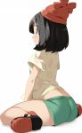  1girl ass beanie black_hair blue_eyes blush closed_mouth female_protagonist_(pokemon_sm) floral_print from_side full_body green_shorts hat kaisen_chuui pokemon pokemon_(game) pokemon_sm shirt shoes short_hair short_sleeves shorts simple_background sitting smile solo white_background 