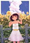  1girl brown_eyes clouds cowboy_shot dress eleaclarisse fence flower hat highres index_finger_raised long_hair looking_at_viewer original short_hair smile solo sun_hat sundress sunflower tan white_dress white_hat 