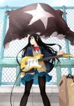  1girl :c amplifier arakawa_(aintnoroom) arm_at_side arm_up black_hair black_legwear blue_eyes blue_jacket blue_skirt bow bowtie cable cardigan chain-link_fence collared_shirt commentary_request day electric_guitar facing_away fence flag frown guitar highres instrument jacket legs_apart long_hair looking_to_the_side original outdoors pantyhose plaid plaid_skirt pleated_skirt red_bow red_bowtie school_uniform shirt skirt solo standing sunlight white_shirt wing_collar 