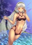  1girl :d altera_(fate) bangs bare_arms bare_shoulders beach bikini black_bikini black_nails breasts clouds cloudy_sky collarbone dark_skin dutch_angle emanon123 eyebrows_visible_through_hair eyelashes fate/grand_order fate_(series) fingernails halter_top halterneck highres holding legs_crossed light_particles looking_at_viewer nail_polish navel night night_sky ocean open_mouth outdoors red_eyes see-through short_hair silver_hair skindentation sky smile solo stomach swimsuit tattoo veil wading white_hair 