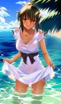  1girl bangs beach black_hair blue_sky blush breasts brown_eyes cleavage clouds collarbone cowboy_shot dark_skin day dress dress_lift fate/grand_order fate/zero fate_(series) jewelry large_breasts lifted_by_self looking_at_viewer ocean official_art outdoors parted_lips partially_submerged pendant plant ponytail sand sash see-through_silhouette shirley_(fate/zero) short_sleeves shoulder_cutout sky smile solo standing tree water white_dress yangsion 