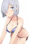  1girl alternate_costume bare_shoulders bikini blue_eyes breasts cleavage closed_mouth cole commentary_request hair_ornament hair_over_one_eye hairclip hamakaze_(kantai_collection) kantai_collection large_breasts looking_at_viewer simple_background solo striped striped_bikini swimsuit white_background white_hair 