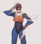  1girl alternate_costume armor bangs body_armor bodysuit bracer brown_eyes brown_gloves brown_hair closed_mouth cowboy_shot ear_piercing gloves grey_background hand_on_hip highres legs_apart looking_at_viewer neosnim overwatch piercing salute scarf short_hair shoulder_pads simple_background slipstream_tracer smile solo spiky_hair sunglasses swept_bangs tracer_(overwatch) turtleneck two-finger_salute vambraces zipper 