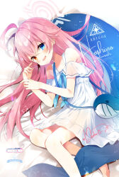  1girl :d abydos_high_school_logo ahoge animal_bag artist_name bag bare_legs bare_shoulders barefoot bed_sheet blue_archive blue_bag blue_eyes blue_ribbon blush casual character_name comiket_105 commentary_request cover cover_page doujin_cover dress frilled_dress frills hair_flaps halo hands_up heterochromia highres hoshino_(blue_archive) huge_ahoge inflatable_toy inflatable_whale long_hair looking_at_viewer lying merchandise_available mocha_(naturefour) neck_ribbon off-shoulder_dress off_shoulder official_alternate_costume on_bed on_side open_mouth orange_eyes pink_hair pink_halo ribbon satchel school_emblem short_dress signature smile solo straight_hair toes white_dress 