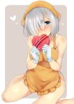  1girl alternate_costume apron bare_legs bare_shoulders box breasts brown_background chocolate chocolate_heart cleavage closed_mouth collarbone covered_navel eyebrows_visible_through_hair frilled_apron frills gift gift_box gloves hair_ornament hair_over_one_eye hairclip hamakaze_(kantai_collection) head_scarf heart heart-shaped_box highres holding kantai_collection legs_apart looking_at_viewer medium_breasts naked_apron orange_apron raised_eyebrows short_hair silver_hair simple_background sitting smile solo tareme ura1011 valentine w_arms wariza white_gloves 