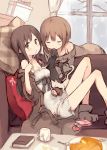  2girls bent_over book box brown_hair camisole cat chemise closed_eyes couch cup food fork gift gift_box heart heart_tail highres kyuri long_hair looking_at_viewer mug multiple_girls off_shoulder on_couch original pillow plate pocky short_hair sitting sweater tail window 