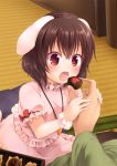  1girl animal_ears black_hair blush chocolate dress feeding floppy_ears hair_between_eyes inaba_tewi nnyara open_mouth pink_dress puffy_short_sleeves puffy_sleeves rabbit_ears red_eyes scrunchie short_hair short_sleeves solo_focus touhou wrist_scrunchie 