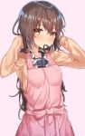  1girl apron arms_up bangs blush breasts brown_eyes brown_hair brown_sweater closed_mouth eyebrows_visible_through_hair hair_between_eyes hair_tie hakuishi_aoi hands_in_sleeves long_hair looking_at_viewer medium_breasts mouth_hold original pink_apron pink_background simple_background solo upper_body wavy_hair 