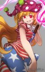  1girl american_flag_dress blonde_hair clownpiece dress fire grey_background grin hat highres jester_cap long_hair mikami_yuuki_(nl8you) neck_ruff pantyhose polka_dot red_eyes short_dress short_sleeves simple_background smile solo star star_print striped teeth torch touhou twitter_username very_long_hair 