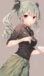  1girl anchovy black_shirt blush breasts clothes_around_waist drill_hair food food_in_mouth fork girls_und_panzer green_hair grey_background hair_ribbon highres jacket_around_waist komeshiro_kasu long_hair looking_at_viewer necktie pasta plate red_eyes ribbon school_uniform shirt simple_background solo twin_drills 