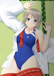  1girl blue_eyes blue_swimsuit competition_swimsuit cowboy_shot grey_hair highres japanese_clothes looking_at_viewer love_live! love_live!_sunshine!! lying miko one-piece_swimsuit sano_souichi short_hair solo swimsuit swimsuit_under_clothes tatami watanabe_you 