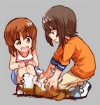  2girls bangs blue_shorts brown_eyes brown_hair brown_pants closed_mouth commentary dog full_body girls_und_panzer hands_on_own_knees light_smile looking_at_another lying multiple_girls nishizumi_maho nishizumi_miho on_back oono_imo open_mouth orange_shirt pants petting pink_shirt shirt shoes short_hair short_sleeves shorts siblings simple_background sisters smile squatting tank_top white_shoes 