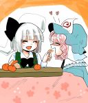  feeding flying_heart food fruit green_vest hat highres komaku_juushoku konpaku_youmu konpaku_youmu_(ghost) kotatsu long_sleeves mandarin_orange mob_cap pink_hair saigyouji_yuyuko shirt smile table touhou triangular_headpiece vest white_shirt 