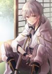  1boy amane_kurumi black_gloves gloves grin hood japanese_clothes katana male_focus partly_fingerless_gloves pom_pom_(clothes) sheath sheathed sitting sliding_doors smile sword touken_ranbu tsurumaru_kuninaga weapon white_hair yellow_eyes 