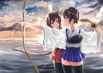  2girls absurdres akagi_(kantai_collection) archery arrow black_legwear blue_hakama bow_(weapon) brown_hair clouds cloudy_sky drawing_bow gloves hakama hakama_skirt highres japanese_clothes kaga_(kantai_collection) kantai_collection multiple_girls muneate nodokana_yuki ocean partly_fingerless_gloves red_hakama short_hair side_ponytail sky smile sunset weapon 