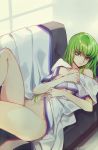  1girl bangs breasts c.c. code_geass couch creayus green_hair long_hair looking_at_viewer lying navel nude on_back sidelocks solo yellow_eyes 