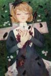 1girl amber_tobi arrow black_feathers blonde_hair closed_eyes closed_mouth cross facing_viewer feathers from_above grass graveyard lips long_sleeves on_ground original robe short_hair solo symbolism white_flower 