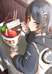  1girl absurdres black_hair black_jacket blush chocolate_icing closed_mouth cup ellen_joe ellen_joe_(on_campus) fins fish_tail food fruit hair_ornament highres himeno_tatsuta holding holding_spoon hood hood_down hooded_jacket ice_cream icing jacket long_sleeves looking_at_viewer looking_back mole mole_under_eye official_alternate_costume raspberry red_eyes red_hair red_nails shark_girl shark_tail short_hair solo spoon strawberry tail x_hair_ornament zenless_zone_zero 