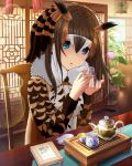  1girl animal_ears artist_request blue_eyes brown_hair chair coat commentary_request cosplay eurasian_eagle_owl_(kemono_friends) eurasian_eagle_owl_(kemono_friends)_(cosplay) flower_pot fur_collar hair_between_eyes head_wings holding idolmaster idolmaster_cinderella_girls indoors kemono_friends long_hair long_sleeves looking_at_viewer multicolored_hair photoshop plant potted_plant sagisawa_fumika sitting solo table teapot white_hair wings 