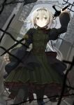  1girl belt black_legwear blurry depth_of_field double-breasted dress dutch_angle expressionless frilled_sleeves frills gothic green_dress grey_eyes grey_hair hair_intakes highres holding holding_sword holding_weapon juliet_sleeves long_hair long_sleeves looking_at_viewer low_ponytail mikoto_kei original outdoors pantyhose petticoat pleated_dress ponytail puffy_sleeves solo standing sword weapon 