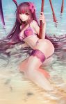  1girl bikini brown_hair derivative_work fate/grand_order fate_(series) flower hair_flower hair_ornament haohe_buguo hibiscus highres long_hair looking_at_viewer parted_lips partially_submerged pink_bikini red_eyes scathach_(fate/grand_order) scathach_(swimsuit_assassin)_(fate) smile solo swimsuit sword water weapon 
