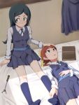  2girls against_wall barbara_(little_witch_academia) bed bed_sheet bedroom black_eyes black_hair book breasts brown_eyes brown_hair feet full_body hair_ribbon hand_on_another&#039;s_head hand_on_another&#039;s_leg hands_on_feet hanna_(little_witch_academia) highres little_witch_academia long_hair looking_to_the_side lying multiple_girls no_shoes on_back on_bed oshiza pleated_skirt ponytail ribbon school_uniform sitting skirt small_breasts socks wand yellow_ribbon yuri 