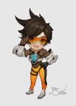  11ama 1girl artist_name chibi dated full_body gloves grey_background hand_on_hip overwatch parted_lips simple_background solo standing tracer_(overwatch) 