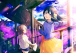  2girls achiki black_hair blurry bridge brown_eyes brown_hair camera commentary_request depth_of_field hair_ornament light_rays long_hair multiple_girls open_mouth original short_hair shorts side_ponytail smile violet_eyes windmill 