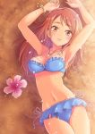  1girl armpits arms_up beach bikini blush breasts brown_eyes brown_hair flower hibiscus houjou_karen idolmaster idolmaster_cinderella_girls long_hair looking_at_viewer lying medium_breasts on_back sand shore smile solo souen_hiro sparkle swimsuit 