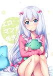  1girl 3: bangs bed_sheet blush bow closed_mouth collarbone copyright_name eromanga_sensei eyebrows_visible_through_hair frills hair_bow izumi_sagiri knees_together_feet_apart koyoka long_hair long_sleeves looking_at_viewer object_hug pajamas pillow pink_bow sitting solo stuffed_animal stuffed_octopus stuffed_toy thighs 