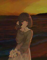  1girl absurdres asahinagi_shio beach black_hair blush brown_eyes commentary_request flower gakuen_idolmaster hair_flower hair_ornament hataya_misuzu highres holding holding_flower horizon idolmaster looking_at_viewer orange_sky outdoors short_hair skirt sky solo sweater tassel tassel_hair_ornament twilight water 