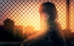  1girl bangs black_eyes black_hair blurry chain-link_fence closed_mouth depth_of_field expressionless fence from_side hood hoodie long_hair looking_at_viewer original outdoors ryokucha_manma sitting solo sunset 