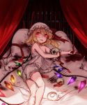  1girl absurdres bed_sheet blonde_hair blood bloomers broken cup curtains fang flandre_scarlet fork hair_between_eyes hat hat_ribbon highres knife looking_at_viewer lying mob_cap on_bed on_side pillow red_eyes red_ribbon ribbon saucer skull solo spill tea teacup tis_(shan0x0shan) touhou underwear wings 