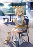 1girl animal_ears bare_shoulders blonde_hair bow bowtie cat cat_ears cat_tail chair elbow_gloves gloves highres kemono_friends open_mouth outdoors sand_cat_(kemono_friends) shirt short_hair sitting skirt sleeveless solo striped_tail table tail treeware umbrella yellow_eyes 