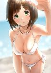  1girl arm_up bare_shoulders beach bikini blurry blurry_background blush breasts brown_hair cleavage collarbone commentary_request eyebrows_visible_through_hair flower green_eyes hair_flower hair_ornament idolmaster idolmaster_cinderella_girls jewelry large_breasts looking_at_viewer maekawa_miku navel necklace parted_lips pearl_necklace short_hair solo sunlight swimsuit takeya_y0615 white_bikini 