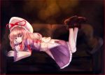  1girl blonde_hair couch curiosities_of_lotus_asia hat ksrk_ss long_hair looking_at_viewer lying mob_cap on_couch on_stomach purple_hair solo touhou violet_eyes yakumo_yukari 