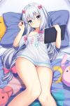  1girl bangs bare_legs blue_eyes blush bow breasts eromanga_sensei hair_bow highres holding holding_pen izumi_sagiri knees_together_feet_apart long_hair looking_at_viewer lying naked_shirt off_shoulder on_bed pillow pink_bow qunqing shirt silver_hair small_breasts solo stuffed_toy stylus tablet very_long_hair 