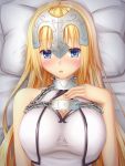  1girl :o blonde_hair blue_eyes blush breasts chains cleavage fate/grand_order fate_(series) headpiece large_breasts long_hair lying on_back pillow ruler_(fate/apocrypha) solo tapisuke upper_body 