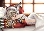  1girl :3 absurdres animal_ears blush claws closed_eyes granblue_fantasy grey_hair hat highres looking_away lying on_stomach pillow red_hat sen_(granblue_fantasy) short_hair smile solo translation_request under_covers yuitanpo 