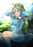  1girl backpack bag blue_boots blue_eyes blue_hair boots breasts day flanvia green_hat hair_bobbles hair_ornament hat highres kawashiro_nitori key large_breasts long_sleeves looking_at_viewer outdoors partially_submerged rubber_boots sitting solo sunlight touhou 